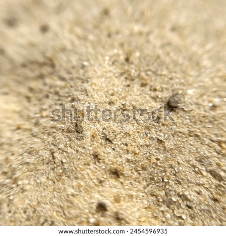 yellow sand texture with focus in the middle of the frame