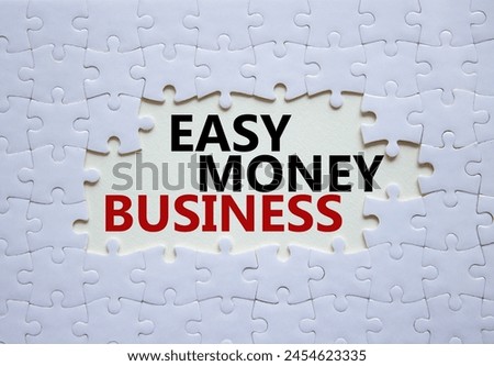 Easy Money Business symbol. Concept words Easy Money Business on white puzzle. Beautiful white background. Business and Easy Money Business concept. Copy space.