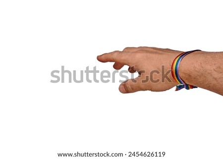 Vibrant bracelet adorning a hand, reaching out against a stark white backdrop, symbolizing connection and diversity. Royalty-Free Stock Photo #2454626119