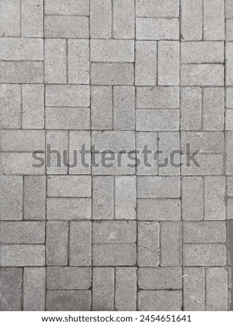 Rectangular bricks in grey color with natural light