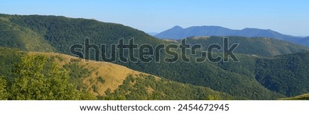 Beautiful mountain landscape. Caucasus Mountains. Panoramic photo. Design for background, cover, screensaver, postcard, calendar.