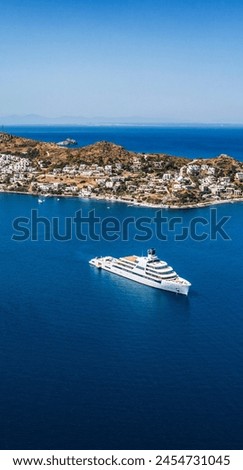 Aerial drone ultra wide panoramic photo of beautiful modern super yacht at deep blue open ocean sea