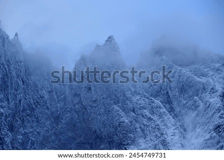 Trollveggen mountains in winter (Norway). Royalty-Free Stock Photo #2454749731