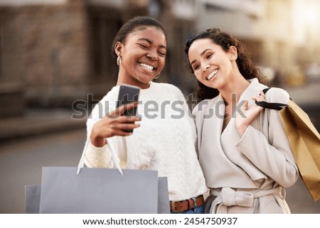Selfie, women and shopping bag for photography for memory by mall, sale or retail together outdoor by store. Happy friends, smile and customer for online shop, discount and deal for fashion clothes