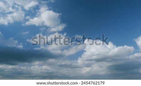 Heavy rain is coming. Cumulus dark clouds harbinger of bad weather and heavy rains. Timelapse. Royalty-Free Stock Photo #2454762179