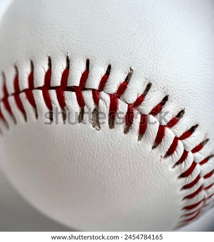 Close up round baseball equipment with red stitches detail object texture photography isolated on background ratio.