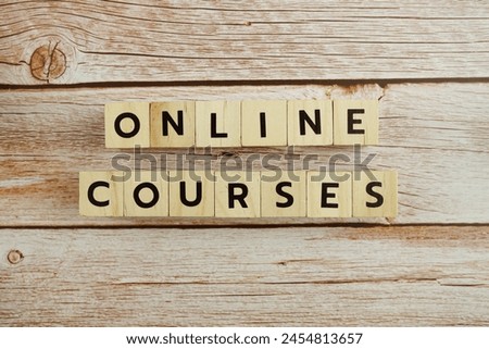 Online Courses word alphabet letters on wooden background