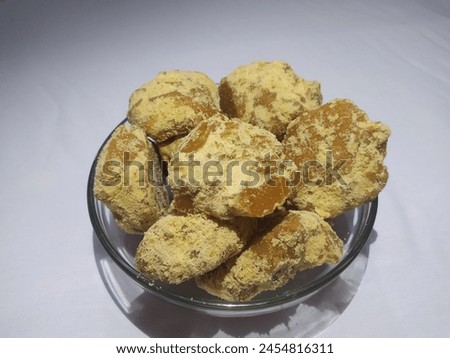 It is a picture of Jaggery made of sugarcane extract and an important part of Asian cuisine.it is organic and healthy ingredient used in sweet dishes and summer drinks in asia