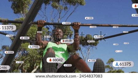 Image of media icons over african american sportsman. social media and communication interface concept digitally generated image. Royalty-Free Stock Photo #2454837083
