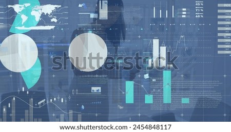 Image of financial data over african american businesswoman in office. business, finance, economy and technology concept digitally generated image.