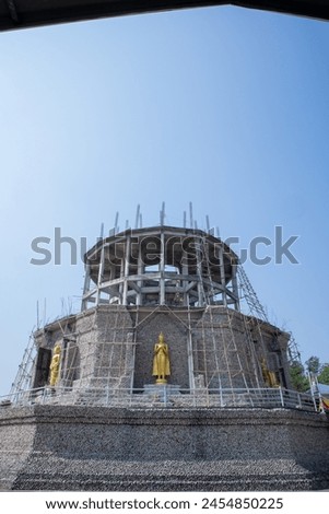 Buddha Statue and landscape view in Wat Chedi Hoi at Pathumthani, Thailand
