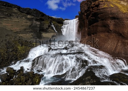 Barnafossar Waterfall, Iceland Up Close: This stock image showcases an up-close view of the stunning Barnafossar waterfall in Iceland.