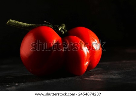 Ugly fruit or vegetable. Severely malformed mutant tomato. Food shops mostly prefer the best quality fruit and vegetables. Ugly fruit is not in high demand. Royalty-Free Stock Photo #2454874239