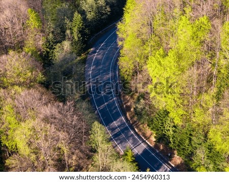 Drone aerial view - windy road in springtime