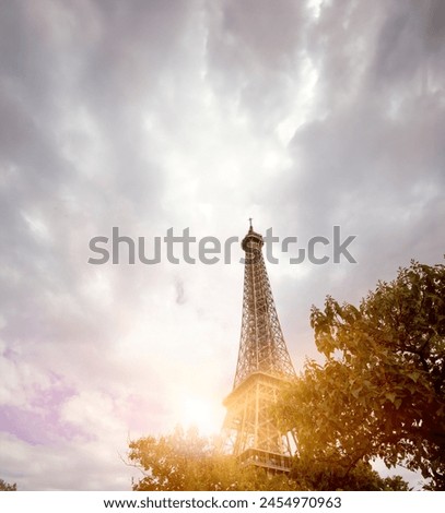 View of Eiffel Tower at sunrise in Paris, France.