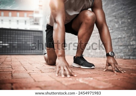 Fitness, start and black man ready for race, cardio workout or running competition in city. Sports, lens flare and runner athlete in outdoor for sprint exercise, marathon training or speed challenge