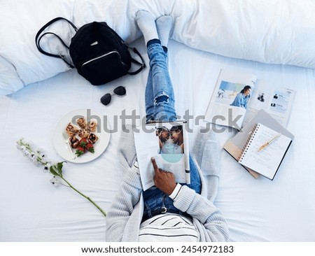 Bed, magazine and above of person reading with food for remote work, content creation and journalism job. Hotel, print and editor with material for travel catalogue, article and portfolio in bedroom