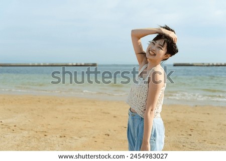 A woman having fun at the seaside