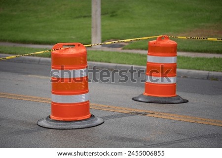 orange maitenence warning construction cones outside