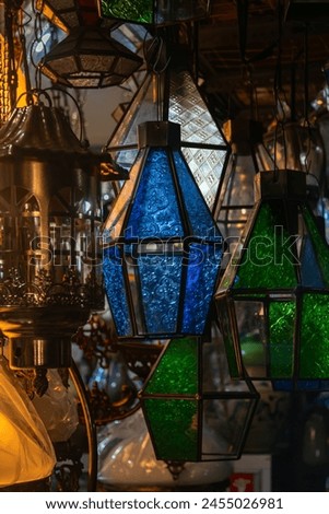 Picture of vintage Middle East colourful glass lamps hanging at an antique shop