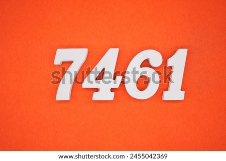Orange felt is the background. The numbers 7461 are made from white painted wood.