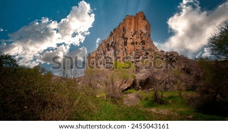 Famous and popular tourist attraction of Cappadocia and Turkey is the Ihlara Valley with a deep gorge and steep cliffs with hiking paths Royalty-Free Stock Photo #2455043161