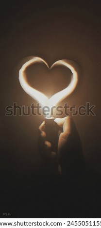 A woman holding a match and a burning flame in the shape of a beautiful and glowing heart, lockscreen wallpaper for your phone. 