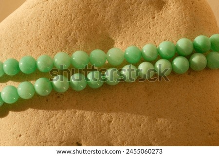 Chrysoprase is a type of chalcedony containing nickel. Royalty-Free Stock Photo #2455060273