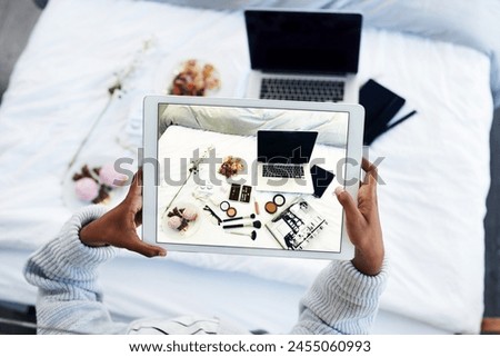 Person, hands and tablet photography or screen home with makeup, content creator or brand ambassador. Top view, bedroom and cosmetic pictures for social media post or unboxing, laptop or influencer