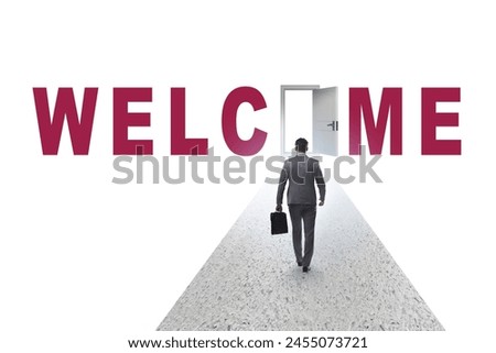 Businessman on the road leading to welcome sign