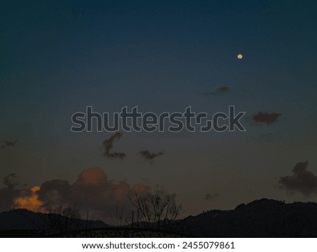 A beautiful picture of moon and clouds 
