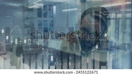 Image of financial data processing over caucasian businessman. business, digital interface and data processing concept digitally generated image.