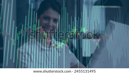 Image of financial data processing over caucasian businesswoman. global finance, business and digital interface concept digitally generated image.