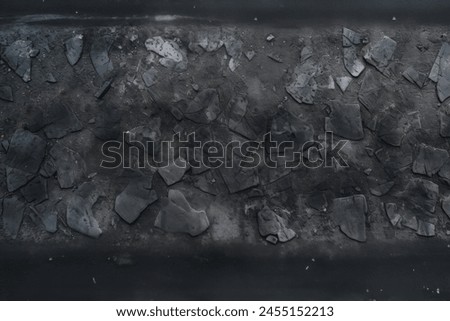 Processed collage of black stony asphalt surface texture. Background for banner, backdrop or texture for 3D mapping