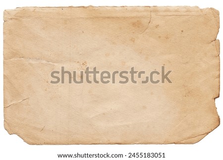 Vintage background of old ancient torn paper texture with spots isolated