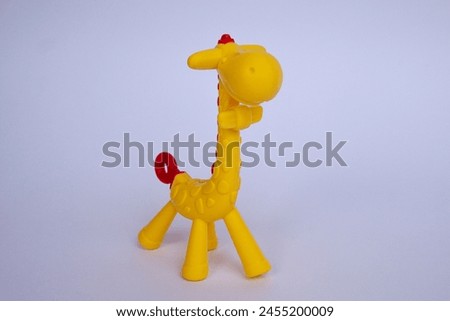 Rubber giraffe toy for baby. Giraffe shaped baby gum reflexology tool. 45 deggres view Rubber giraffe.