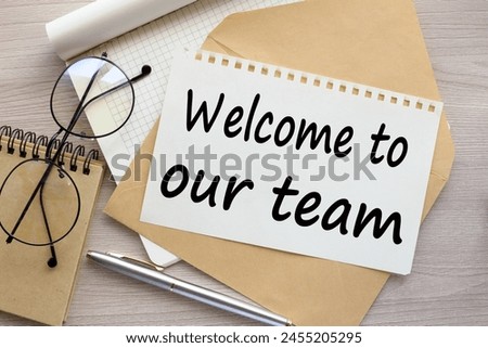 welcome to our team concept. Copy space. text on the page on the envelope