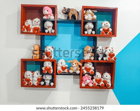 soft dolls in the shelf of home for decoration.
