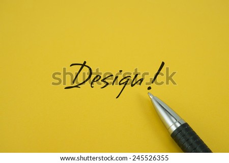 Design! note with pen on yellow background