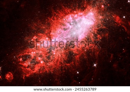 Red galaxy in deep space. Elements of this image furnished by NASA. High quality photo