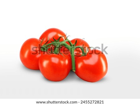 bunch of ripe red tomatoes on white background