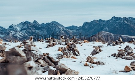 Autumn trekking in the Tatra National Park, among the snow-capped peaks of the Western Tatras Royalty-Free Stock Photo #2455278777