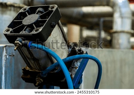 A close-up on the heart of a machine, vital to Russia metal coating craft, throbbing with industrial might. Royalty-Free Stock Photo #2455310175
