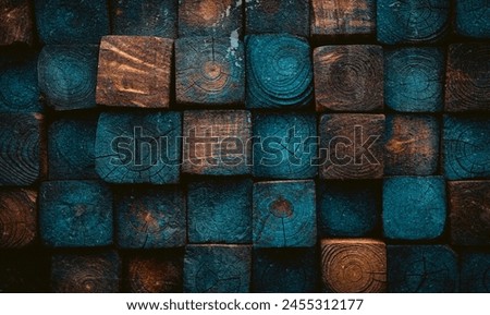 Empty old,cracked and grungy dark wood wall texture backgrounds. Dark wooden cubes background. Frontal view. Free copy space.