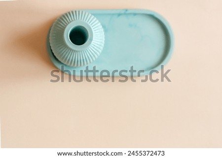 interior items. ceramic vase and stand on a light background. free space for text