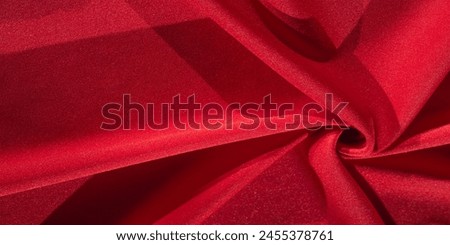 Red silk. As an abstract background, you can use the texture of luxurious red silk or satin. colorful texture, background, pattern