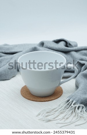 White cup mockup Blank, Coffee Cup mock up cover, White Cup with aesthetic background , white cup on a table with silver background Royalty-Free Stock Photo #2455379431