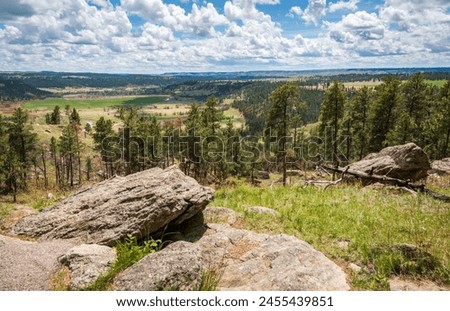 The Rugged Landscape at Devils Tower National Monument, Butte in Wyoming, USA Royalty-Free Stock Photo #2455439851