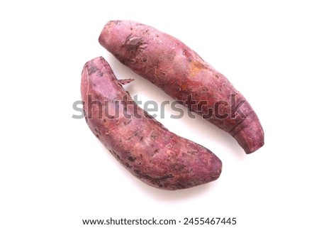 Hot Baked Organic Japanese Sweet Potatoes by air frier oven, diet and healthy food, isolated on white background. Boiled or grilled yellow sweet potato Royalty-Free Stock Photo #2455467445