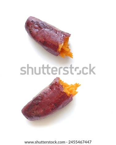 Hot Baked Organic Japanese Sweet Potatoes by air frier oven, diet and healthy food, isolated on white background. Boiled or grilled yellow sweet potato Royalty-Free Stock Photo #2455467447